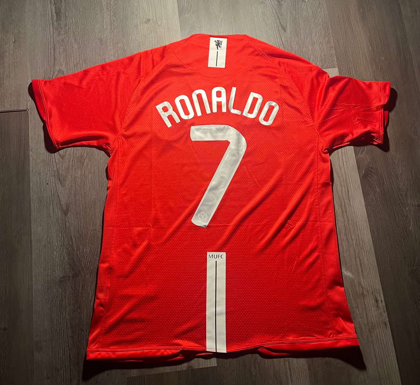 Cristiano Ronaldo Manchester United jersey, specifically a retro fan version of the 2007-2008 home shirt