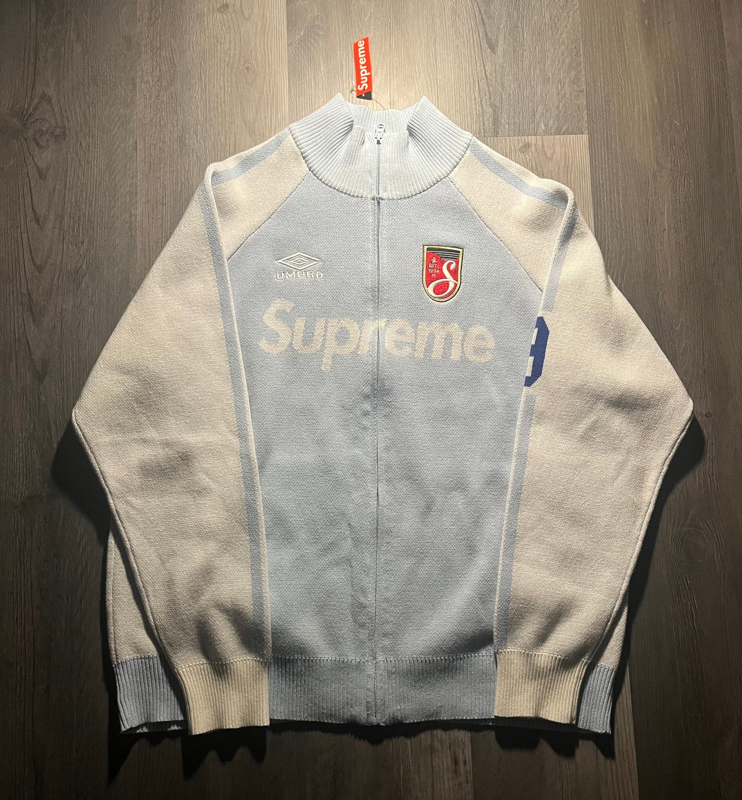 Supreme Umbro Zip Up Sweater, part of the Supreme Spring/Summer 2025 (SS25) collection