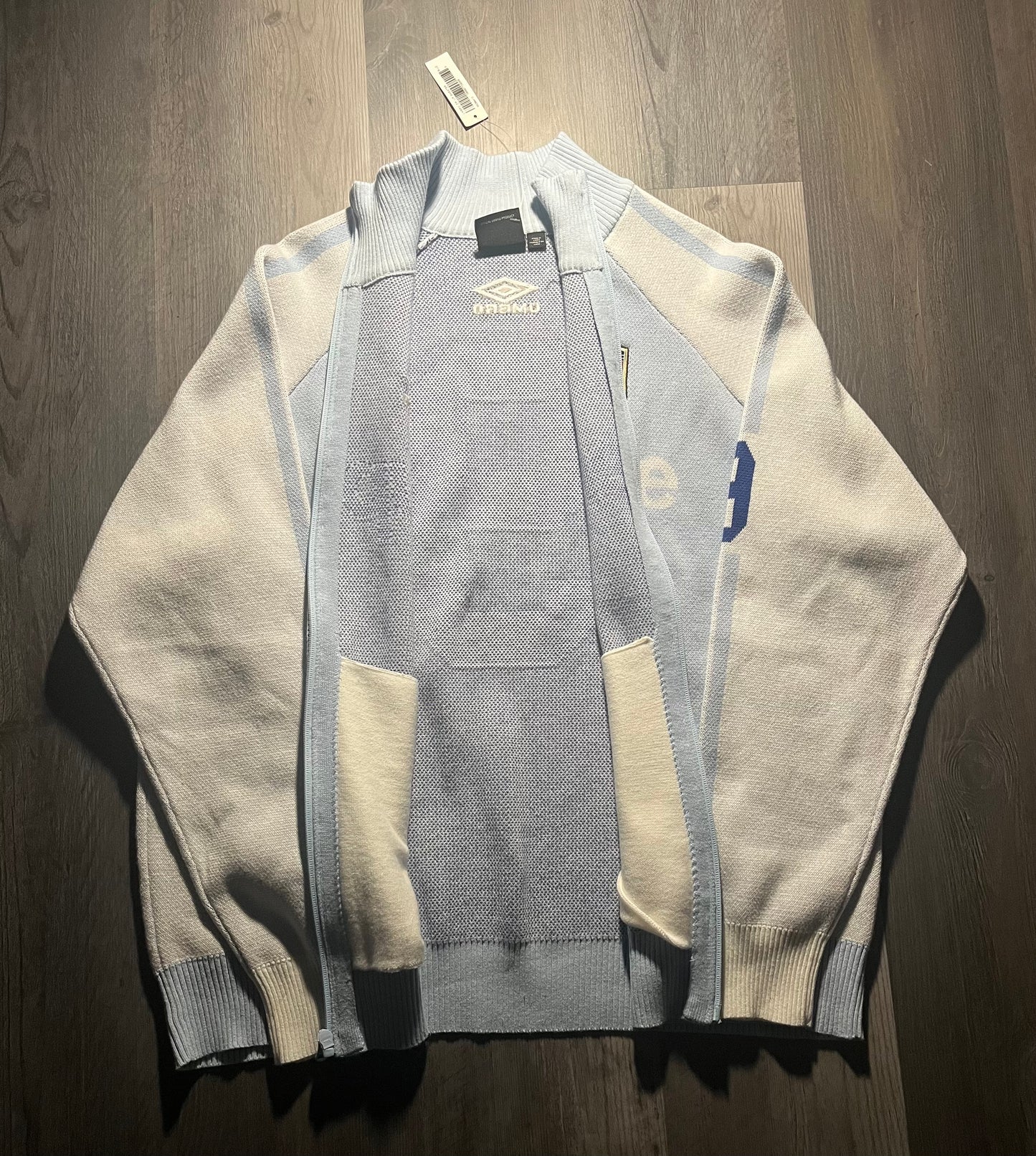 Supreme Umbro Zip Up Sweater, part of the Supreme Spring/Summer 2025 (SS25) collection